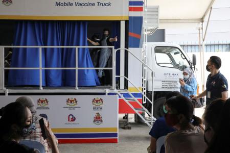 Malaysia reports 150% spike in arrivals at Covid assessment centres 