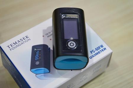 Oximeters given out by Temasek sold online for as much as $30