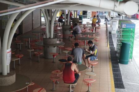 TraceTogether check-in a must at all wet markets, hawker centres