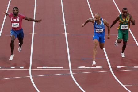 Olympics: Italian sprinter Lamont Marcell Jacobs wins men's 100m race