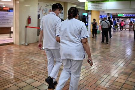 Healthcare workers &#039;grapple with fatigue&#039; as cases rise in Singapore