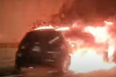 Woman rescued just before crashed car catches fire on SLE