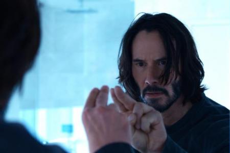 Keanu Reeves journeys down the rabbit hole again in The Matrix Resurrections