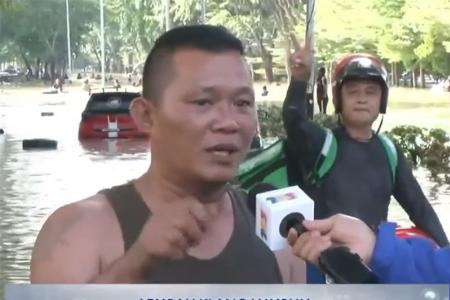Malaysia's 'GrabFloat rider' amuses viewers during live TV interview