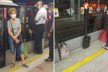 Elderly folk lean against MRT platform doors, chope space with bags