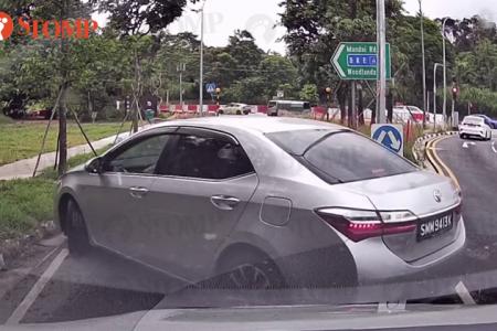 Driver blocks filter lane, force-reverses his way out