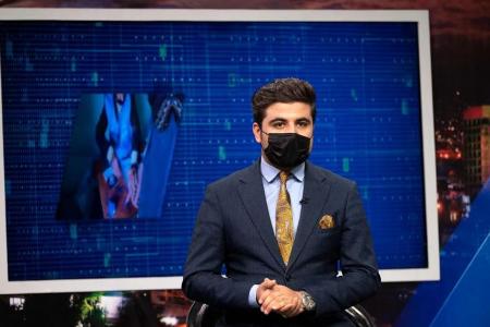 Male TV presenters wear masks in protest against Taliban ruling