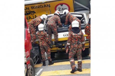 Driver in Malaysia killed as signboard falls on lorry after crash