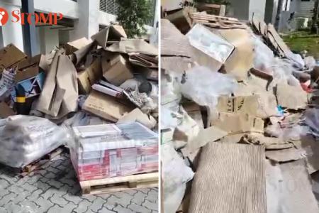 Despite warning notices, piles of rubbish greet residents moving into new Woodleigh block