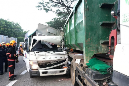 Lorry driver who crashed into truck, killing 2 passengers, gets jail and driving ban