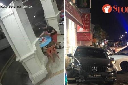 Car crashes into parked Benz; nearly hits people sitting outside coffee shop