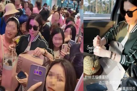 HK actress Charmaine Sheh receives – and savours – durian cake in Malaysia