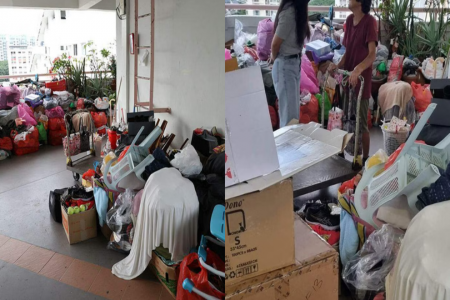 Karang guni woman says clutter at corridor is not obstructive, says she's earning her own keep