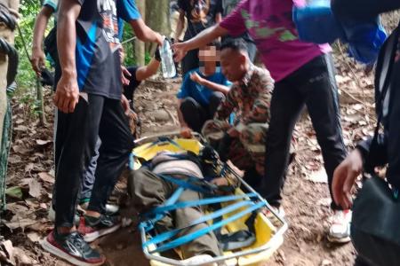 Woman rescued while hiking in M'sia was 'possessed', say family