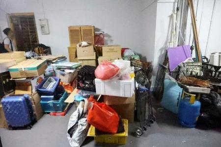 Neighbour of Jurong hoarder places fire extinguishers on shoe rack as safety precaution