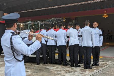 Sombre send-off for firefighter who died in line of duty