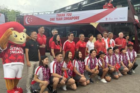 Olympians treated to island-wide cheers in victory parade