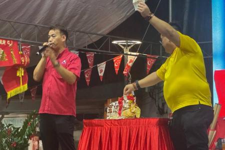 Hokkien chants and high stakes: Meet auctioneer Kelvin Oh