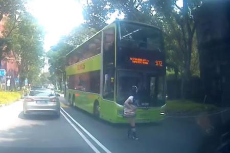 Jaywalker narrowly avoids getting hit by bus at Orchard