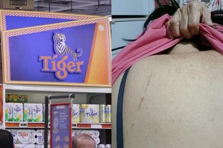 Falling beer ad injures elderly woman at Woodlands FairPrice