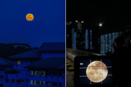 Singaporeans delighted to see supermoon on cloudy night
