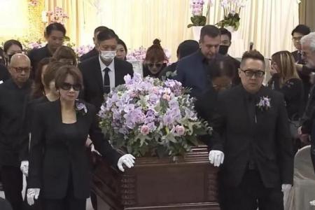 Late singer Coco Lee’s estranged husband says at crematorium he loved her 