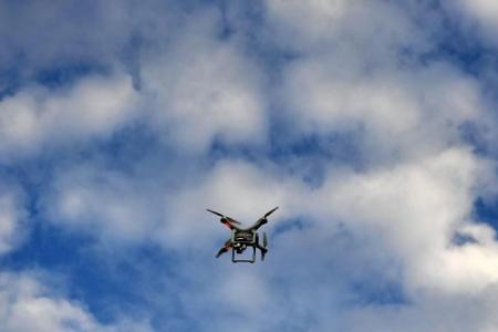 4 men accused of flying drones in protected areas