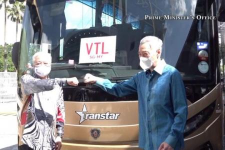 Malaysian PM Ismail, PM Lee witness land VTL launch at Woodlands Checkpoint