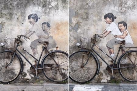 Penang murals restored by Lithuanian artist Ernest Zacharevic