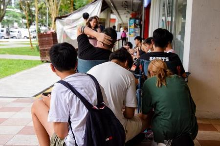 Taylor Swift fans queueing for tickets told to leave SingPost outlets when malls close