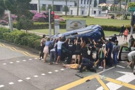 Certis officers among group who lifted car, helped victims in accident outside Parliament House