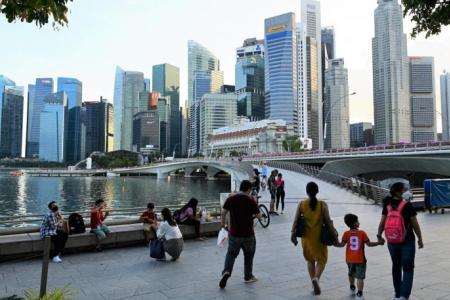 S'pore has reached major Covid-19 milestone, but will not take 'Freedom Day' approach: PM Lee