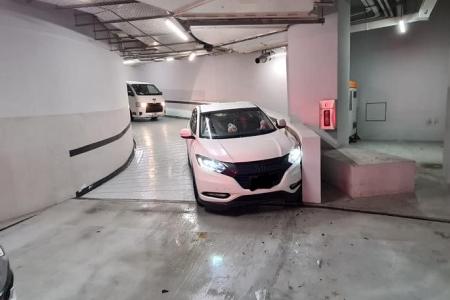 Cars slide and crash into Funan mall carpark wall 