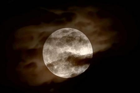 Singaporeans delighted to see supermoon on cloudy night
