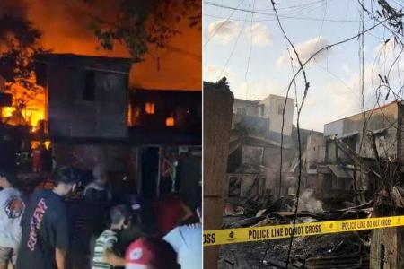 Seven dead, including two children found ‘hugging each other’, in fire near Manila