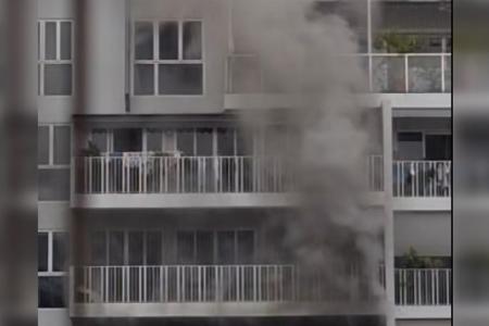 50 evacuated, one taken to hospital in Woodlands condo fire