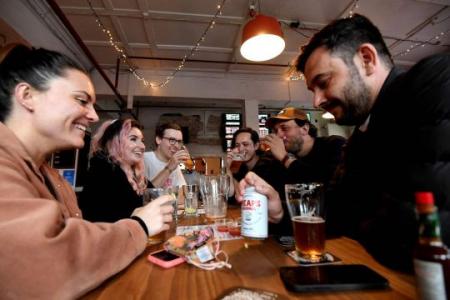 Pubs, parties push Australia's Covid-19 cases to record level