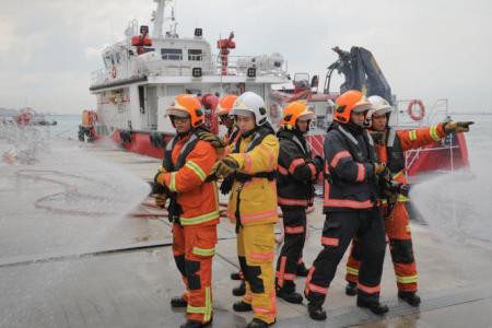 Firefighters scaled 152 steps and linked 18 lengths of hoses to fight Kusu Island fire