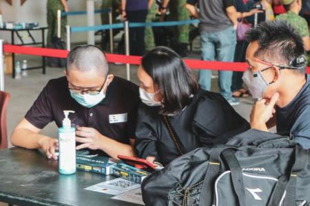 Parents, loved ones attend enlistment day at BMTC on Pulau Tekong after 2-year hiatus