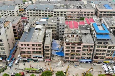 Hopes dim for finding China building collapse survivors