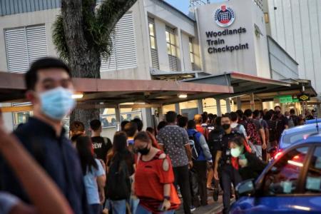 Long queues of people at Woodlands checkpoint ahead of Good Friday weekend