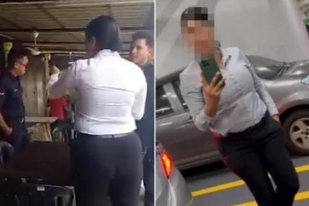 Malaysian cop arrested after viral videos show her shouting, hurling insults at others