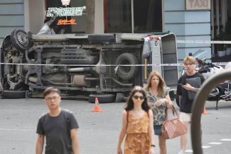 Man taken to hospital after his truck skids and hits lamp post in Bras Basah