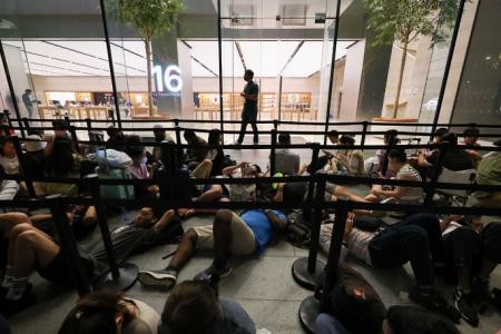 iPhone 16 launches to cheers and applause at Orchard store