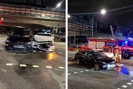 2 people trapped in cars that collide at Toh Guan Road