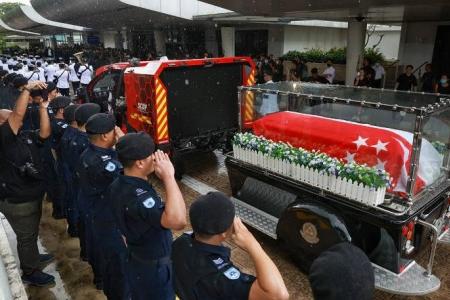 Family and friends bid farewell to NSF firefighter Edward Go at ceremonial funeral in Mandai