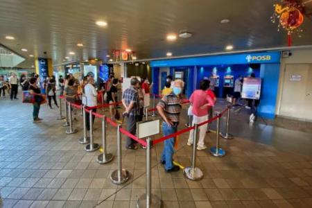 Long queues at banks, pop-up ATMs for new Chinese New Year notes