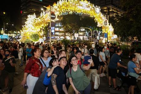 Orchard Road Christmas lights come on, heralding the holiday season