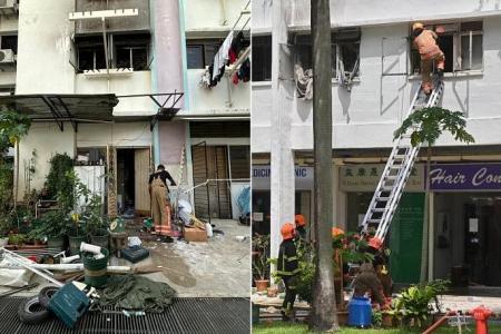 Man, 70, taken to hospital after fire in Geylang flat