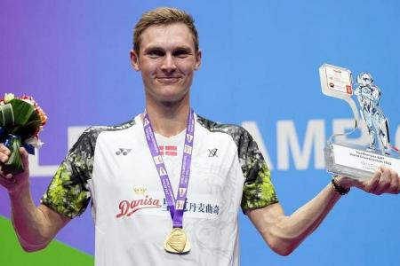 Axelsen aims higher after claiming second badminton world title